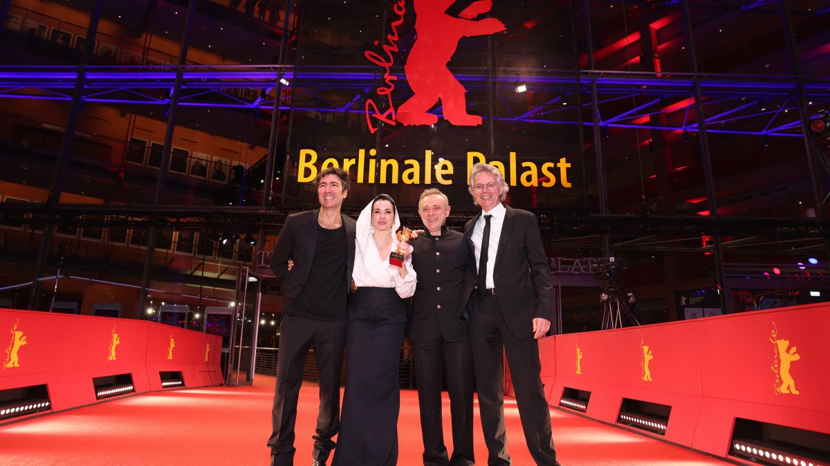 (From L-R) Ilker Çatak, Özgü Namal, Tansu Bicer and Ingo Fliess pose with the Golden Bear for Best Film for “Gelbe Briefe (Yellow Letters)” on the red carpet after the Award Ceremony of the 76th Berlinale International Film Festival Berlin at Berlinale Palast, Berlin, Germany, Feb. 21, 2026. (Getty Images Photo)