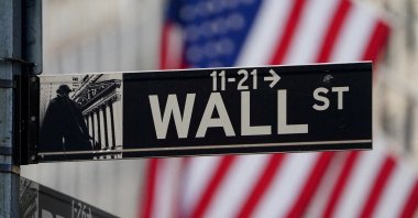 The Wall Street sign is pictured at the New York Stock Exchange (NYSE) in the Manhattan borough of New York City, New York, U.S., March 9, 2020. (Reuters Photo)