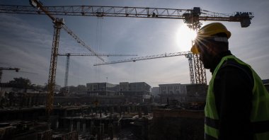 A worker is photographed on a construction site in the southeast following the devastating 2023 earthquakes, Türkiye, Feb. 3, 2026. (AA Photo)