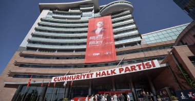 Journalists wait outside at the headquarters of the CHP, Ankara, Türkiye, Sept. 15, 2025. (AFP Photo)