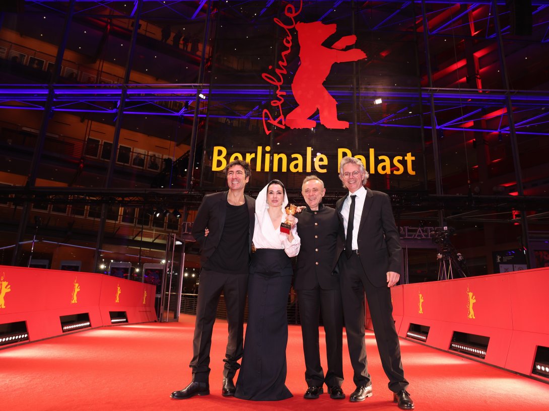 (From L-R) Ilker Çatak, Özgü Namal, Tansu Bicer and Ingo Fliess pose with the Golden Bear for Best Film for “Gelbe Briefe (Yellow Letters)” on the red carpet after the Award Ceremony of the 76th Berlinale International Film Festival Berlin at Berlinale Palast, Berlin, Germany, Feb. 21, 2026. (Getty Images Photo)