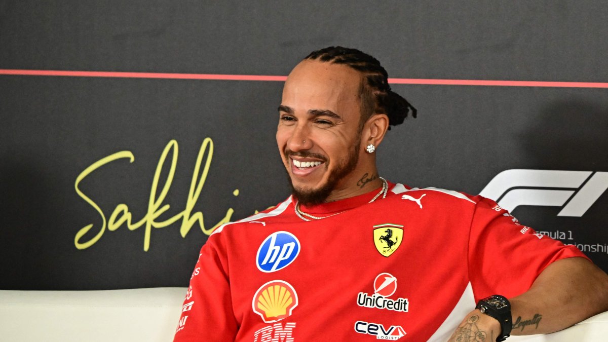 Ferrari's British driver Lewis Hamilton reacts during a press conference on the first day of the second Formula One pre-season test at the Bahrain International Circuit, Sakhir, Bahrain, Feb. 18, 2026. (AFP Photo)