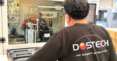 A worker operates machinery at the production facility of Dostech GmbH, Moessingen, Germany, Feb. 10, 2026. (Reuters Photo)