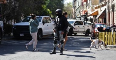 Security personnel guard on a street in Mexico City, Mexico, Feb. 23, 2026. (DHA Photo)