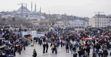 People are seen in the famous Eminönü neighborhood, Istanbul, Türkiye, Feb. 15, 2026. (AA Photo)