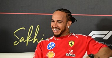 Ferrari's British driver Lewis Hamilton reacts during a press conference on the first day of the second Formula One pre-season test at the Bahrain International Circuit, Sakhir, Bahrain, Feb. 18, 2026. (AFP Photo)