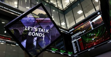 A screen displays financial market information at the London Stock Exchange, London, U.K., Jan. 19, 2026. (Reuters Photo)