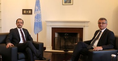 Greek Cypriot leader Nikos Christodoulides (L) and TRNC President Tufan Erhürman pose for a picture during a meeting in the U.N. buffer zone of the capital Nicosia, Feb. 24, 2026. (Reuters Photo)