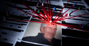  This photo illustration shows redacted documents from the Epstein Library files released by the U.S. Department of Justice in Washington, D.C., Feb.18, 2026. (AFP Photo)
