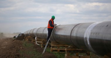 A worker is seen next to a pipe at a construction site on the extension of Russia's TurkStream gas pipeline, in Letnitsa, Bulgaria, June 1, 2020. (Reuters File Photo)