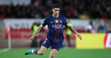 Paris Saint-Germain's Achraf Hakimi controls the ball during the UEFA Champions League knockout round playoff first leg football match between AS Monaco and Paris Saint-Germain at the Stade Louis II, Principality of Monaco, Feb. 17, 2026. (AFP Photo)