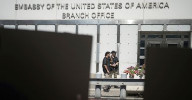 Security guards stand outside of the the U.S. Embassy branch office in Tel Aviv, Israel, July 24, 2025. (AP Photo)