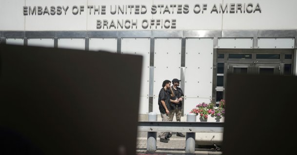 Security guards stand outside of the the U.S. Embassy branch office in Tel Aviv, Israel, July 24, 2025. (AP Photo)