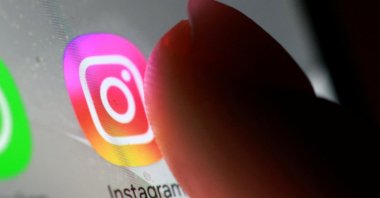 The Instagram app icon is seen on a smartphone in this illustration taken Oct. 27, 2025. (Reuters Photo)