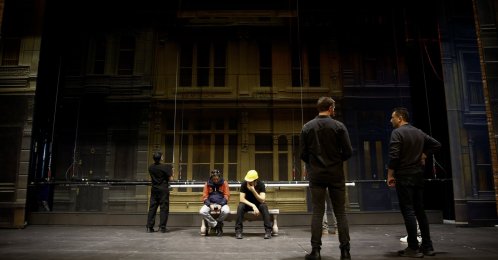 The “men in black,” SAMDOB’s technical crew, prepare the stage for "Singin’ in the Rain," Samsun, northern Türkiye, Feb. 23, 2026. (AA Photo)