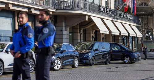 Police officers stand in front of the Hotel des Bergues, Geneva, Switzerland, Feb. 26, 2026. (Reuters Photo)
