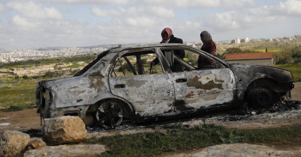 People inspect a site damaged in Israeli attacks in Hebron, the occupied West Bank, Feb. 25, 2026. (AA Photo)