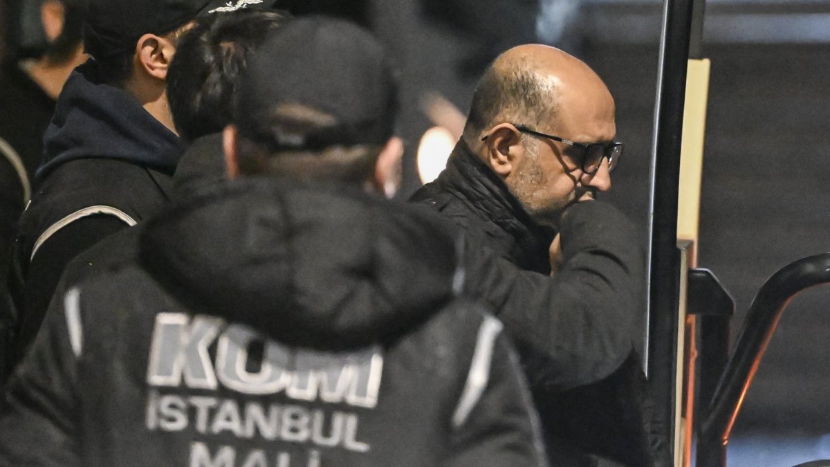 Police escort Aziz Ihsan Aktaş after his detention, Istanbul, Türkiye, Jan. 17, 2025. (AA Photo)