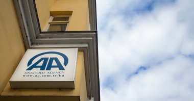 The Anadolu Agency logo is seen at the entrance of its main office in Sarajevo, Bosnia-Herzegovina, April 17, 2017. (Shutterstock Photo)