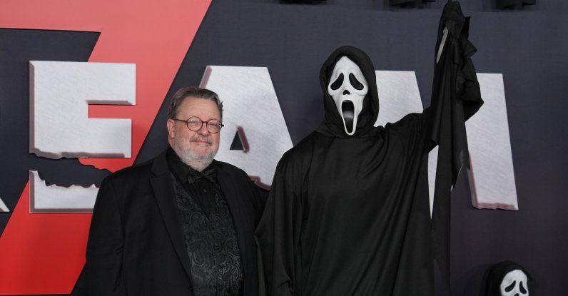 Roger Jackson (L), who provides the voice of the "Scream" franchise's villain "Ghostface," poses with an actor portraying the character at the premiere of the film "Scream 7", Los Angeles, U.S., Feb. 25, 2026. (AP Photo)