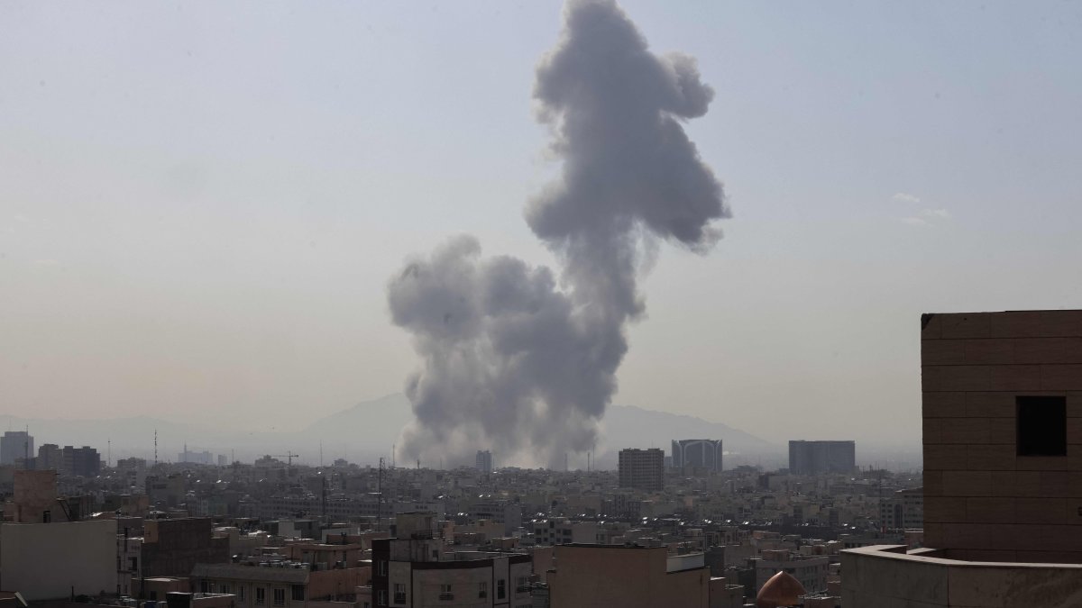 A plume of smoke rises following a reported explosion in Tehran, Iran, Feb. 28, 2026. (AFP Photo)