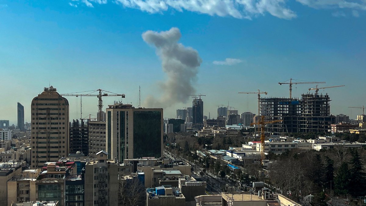 A plume of smoke rises following a reported explosion in Tehran, Iran, Feb. 28, 2026. (AFP Photo)