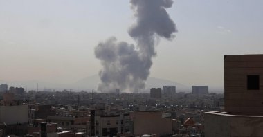 A plume of smoke rises following a reported explosion in Tehran, Iran, Feb. 28, 2026. (AFP Photo)