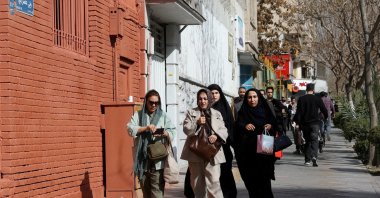 People run for cover following an explosion, after Israel said it launched a pre-emptive attack against Iran, in Tehran, Iran, Feb. 28, 2026. (Reuters Photo)