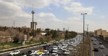 Motorists make their way along a street amid U.S., Israeli strikes, in Tehran, Iran, Feb. 28, 2026. (AFP Photo)