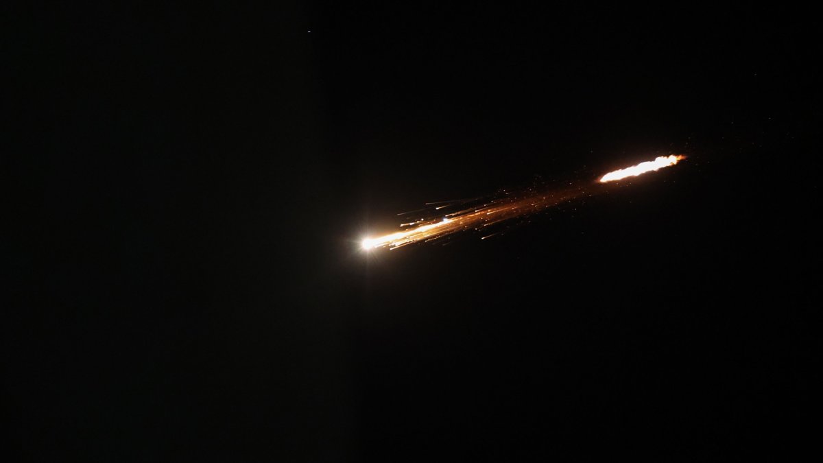 A picture shows an Iranian projectile trailing in the sky above the city of Ramallah, in the Israeli-occupied West Bank, Feb. 28, 2026. (AFP Photo)