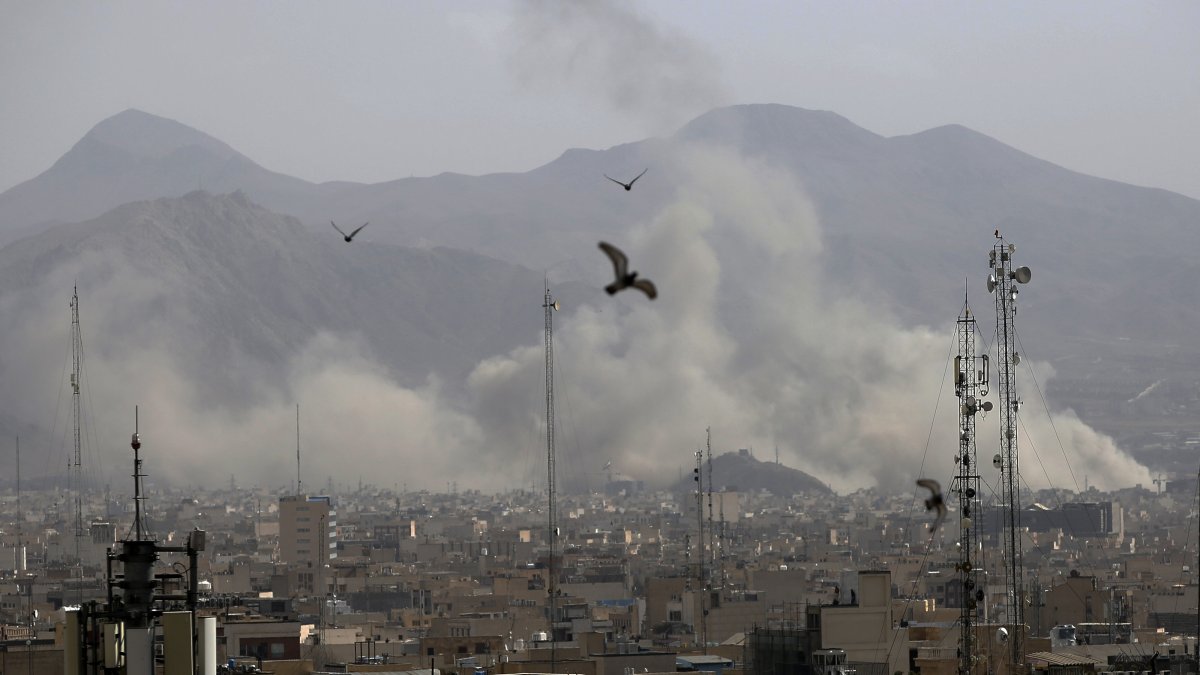 Plumes of smoke rise from multiple sites targeted by Israeli airstrikes on Tehran, Iran, March 1, 2026. (AA Photo)