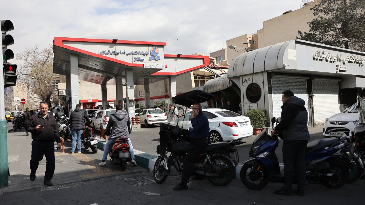 People wait for their turn at a fuel station, after Israel and the U.S. launched strikes on Iran, in Tehran, Iran, Feb. 28, 2026. (Reuters Photo)