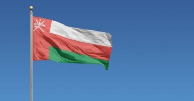 The flag of Oman in front of a clear blue sky. (DHA File Photo)