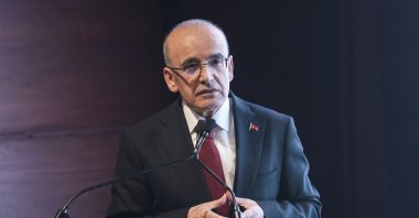 Treasury and Finance Minister Mehmet Şimşek delivers a speech at an event, Istanbul, Türkiye, Feb. 28, 2026. (AA Photo)