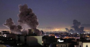 Smoke plumes rise following missile strikes in Tehran, Iran, March 1, 2026. (AFP Photo) 