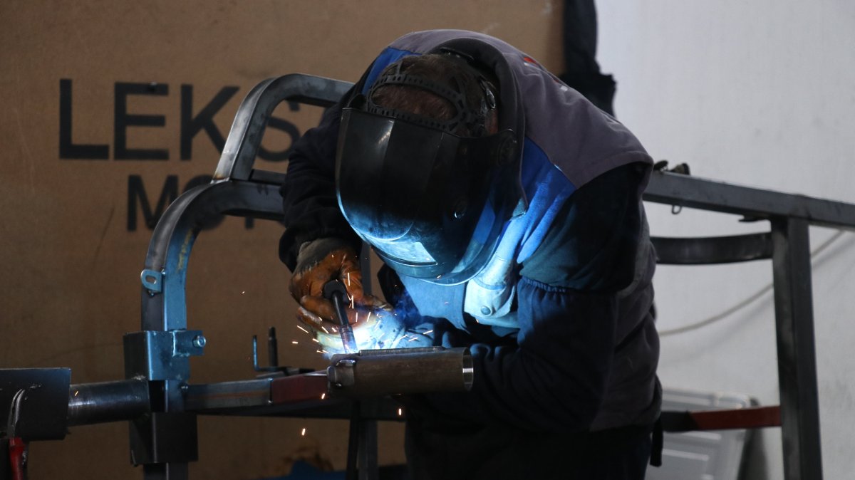 A worker is seen at a factory in Isparta province, western Türkiye, Feb. 3, 2026. (AA Photo)