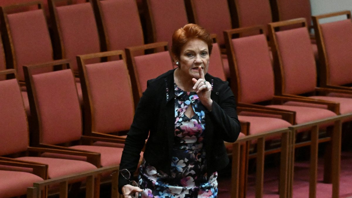 One Nation leader Pauline Hanson walks out during debate on a censure motion in the Senate chamber at Parliament House in Canberra, Australia, March 2, 2026. (Reuters Photo)