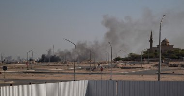 Smoke rises from a reported Iranian strike in the area where the U.S. Embassy is located in Kuwait City, Kuwait, March 2, 2026. (AFP Photo)