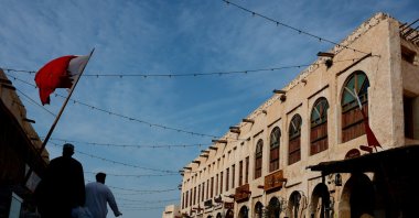People walk through the old town city center in Doha, Qatar, March 1, 2026. (EPA Photo)