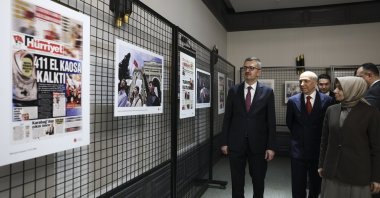 Burhanettin Duran, Türkiye’s communications director, and AK Party Deputy Group Chair Leyla Şahin Usta visit the exhibition held as part of the event “Memory and Truth: Feb. 28 and Disinformation Panel,” Ankara, Türkiye, March 2, 2026. (AA Photo)
