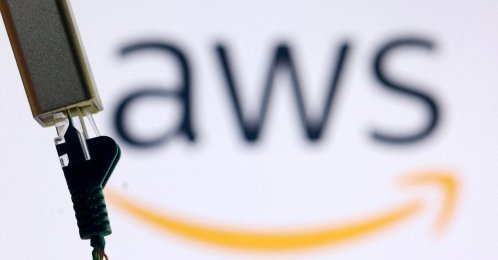 AN a AWS logo and broken ethernet cable are seen in this illustration, Oct. 20, 2025. (Reuters Photo)