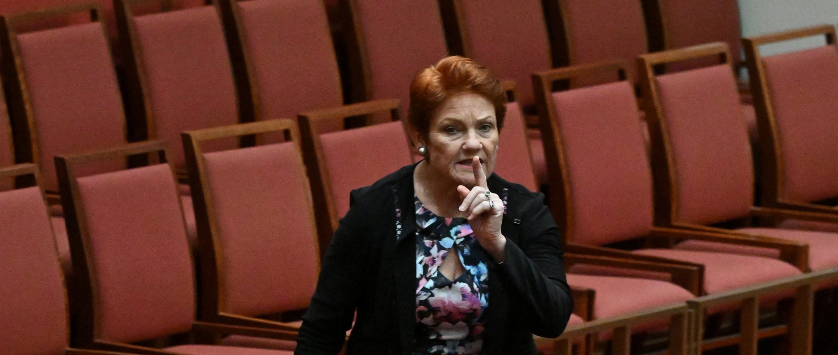 One Nation leader Pauline Hanson walks out during debate on a censure motion in the Senate chamber at Parliament House in Canberra, Australia, March 2, 2026. (Reuters Photo)