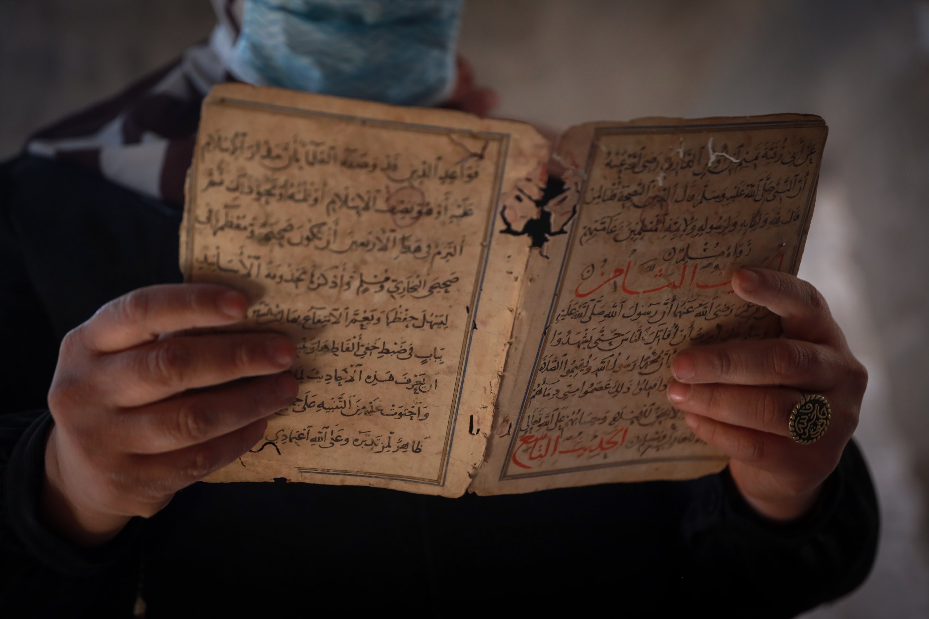 Gaza volunteers salvage books from war-damaged mosque library