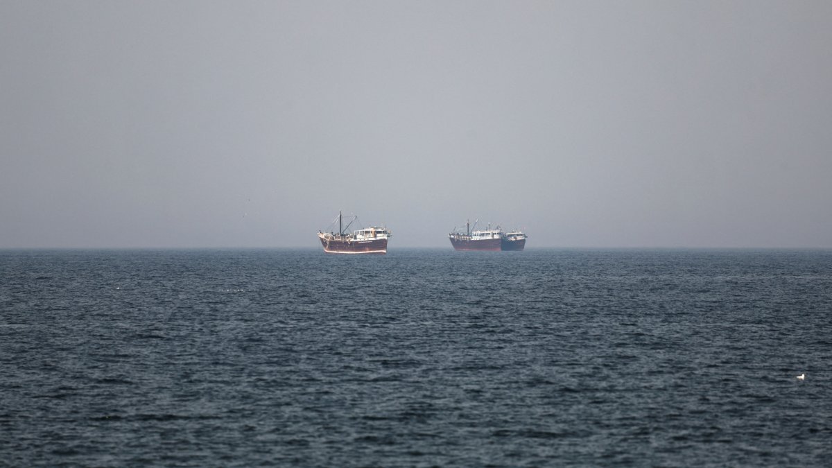 Boats in the Strait of Hormuz amid the U.S.-Israeli conflict with Iran, as seen from Musandam, Oman, March 2, 2026. (Reuters Photo)