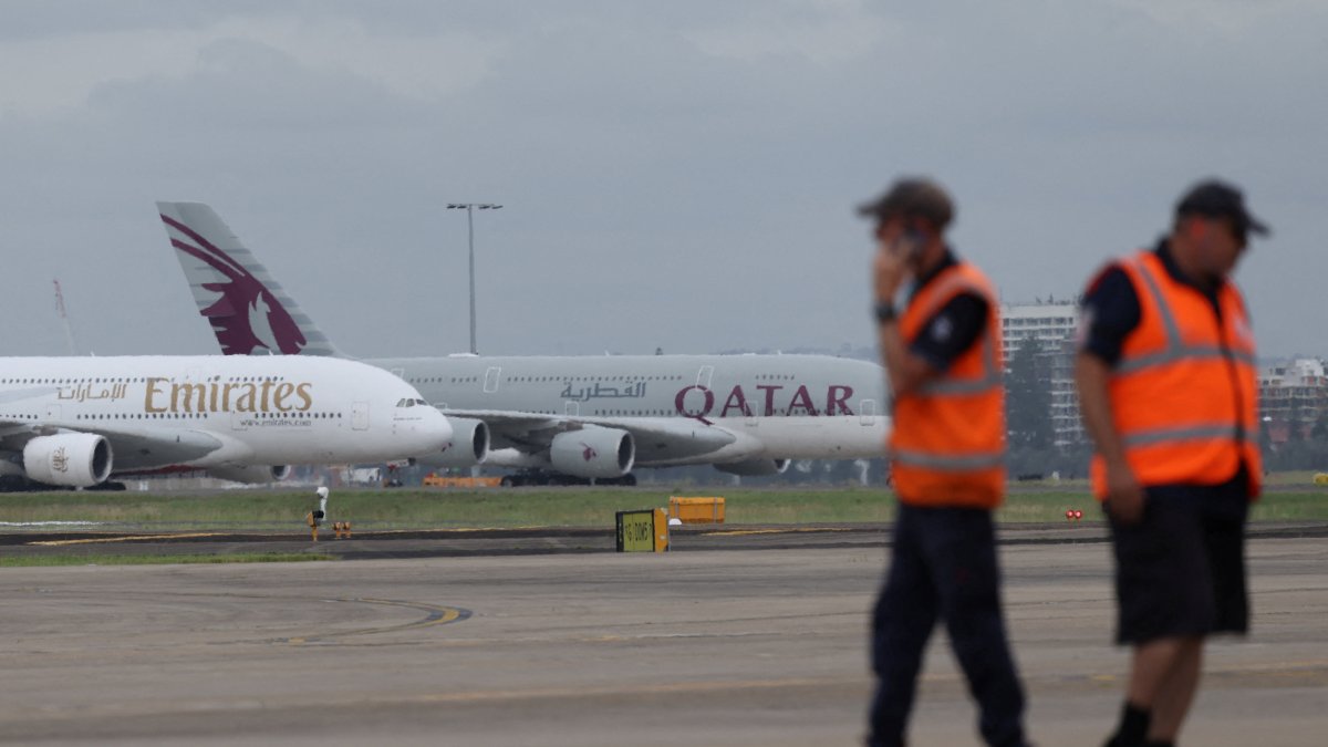 Emirates and Qatar Airways planes sit on the tarmac at Sydney Kingsford Smith Airport in Sydney, Australia, March 3, 2026. (Reuters Photo)