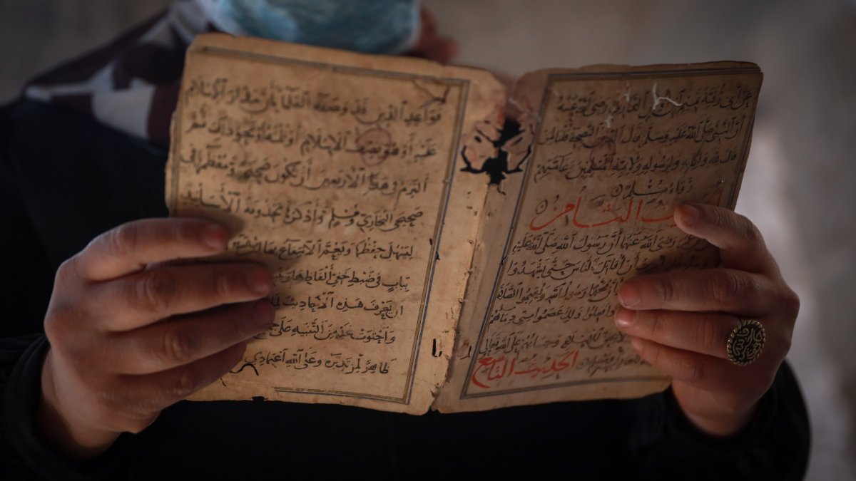 Gaza volunteers salvage books from war-damaged mosque library