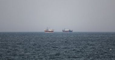 Boats in the Strait of Hormuz amid the U.S.-Israeli conflict with Iran, as seen from Musandam, Oman, March 2, 2026. (Reuters Photo)