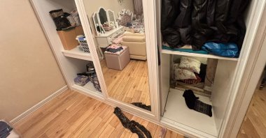 A view of the wardrobe compartment where Şadan Sakınan, detained in a FETÖ-linked probe, was found hiding during a police raid on a cell house, Çankaya, Ankara, Türkiye, March 2, 2026. (AA Photo)