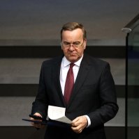 German Defense Minister Boris Pistorius walks in the lower house of parliament Bundestag during a debate in Berlin, Germany, March 4, 2026. (Reuters Photo)