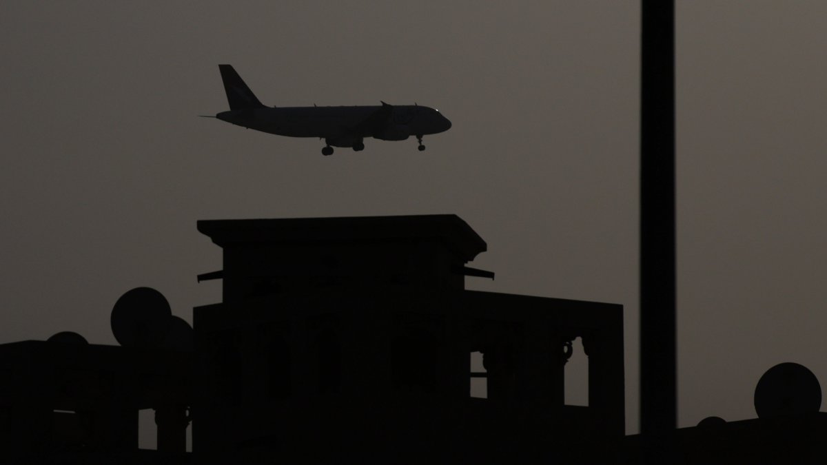 A plane prepares to land at Dubai International Airport, Dubai, UAE, March 3, 2026. (EPA Photo)